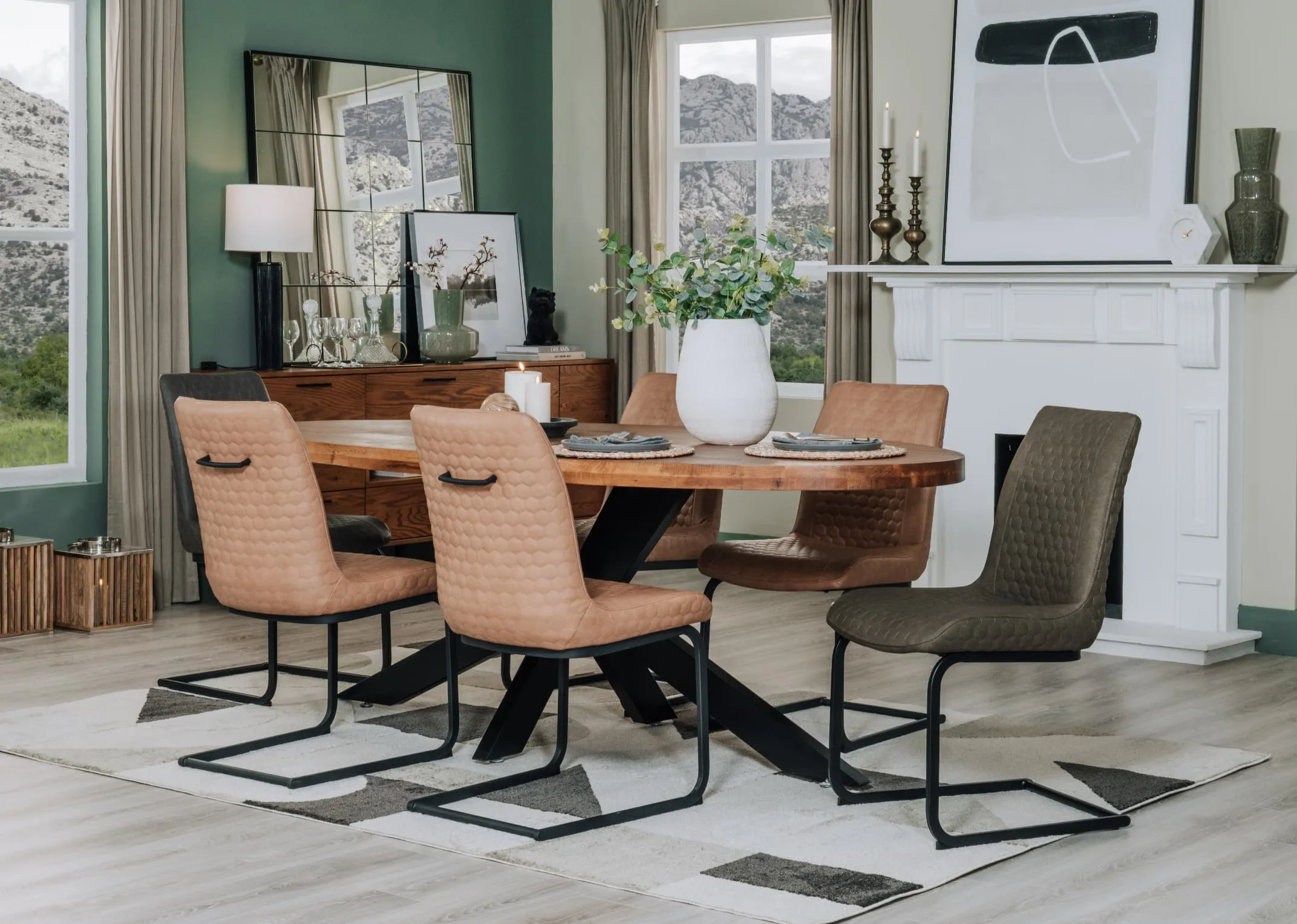 A lifestyle image of the Oslo table with Barton chairs on the Bruni rug.