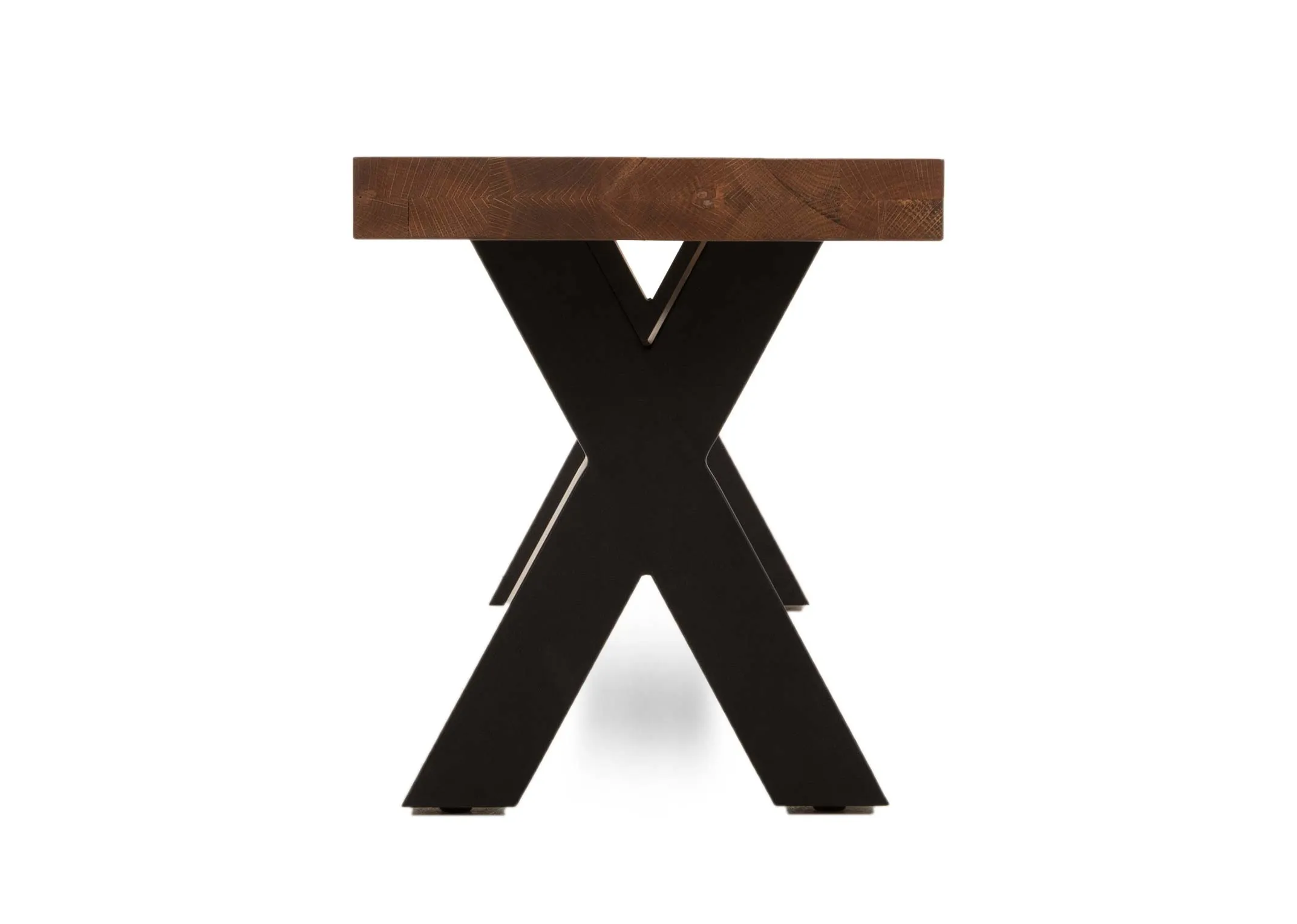 A chestnut oak dining bench with metal x base from EZ Livings Davos range. Side view of x black base