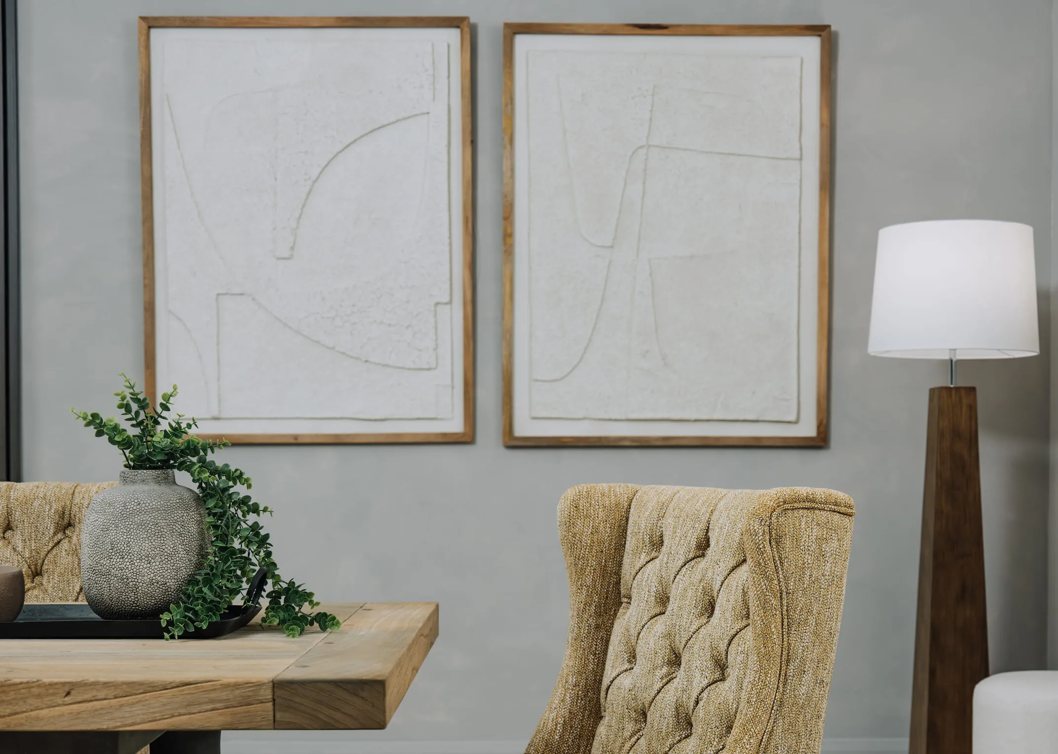 A lifestyle image of the Bundi and Dandeli pictrues with the Cannes table and Tommy mustard chair.