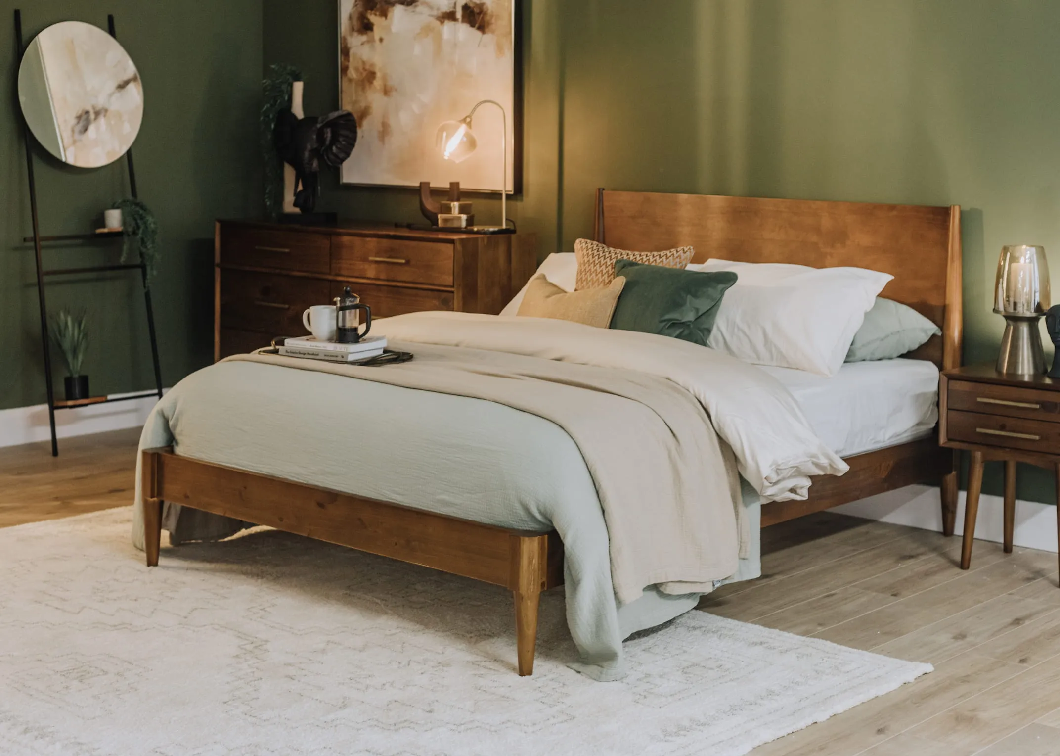 A lifestyle image of the Leya Bedframe with matching locker & chest with Dreamy canvas.