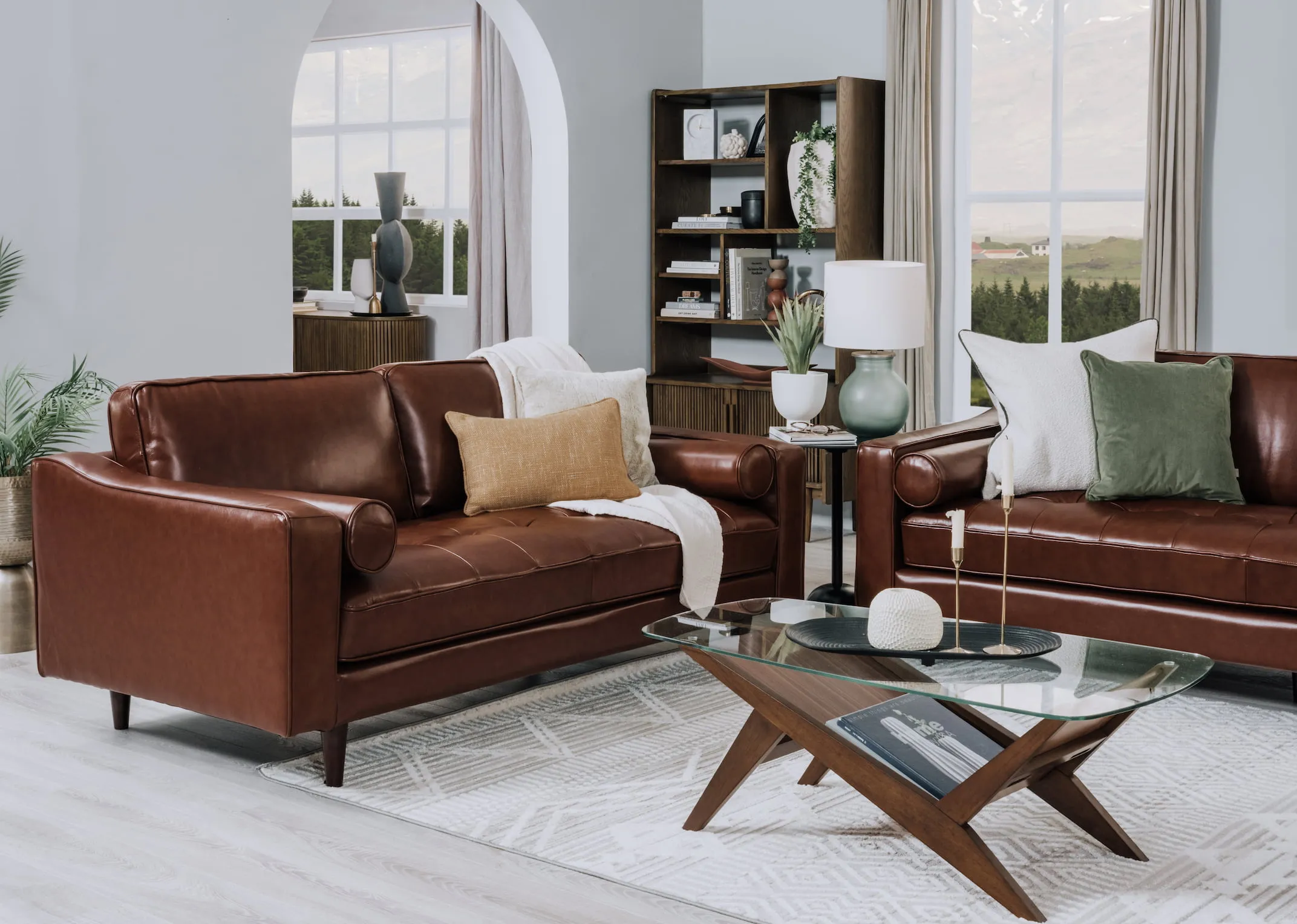 A lifestyle image of the Genoa sofas wth Henry coffee table and delano bookcase.