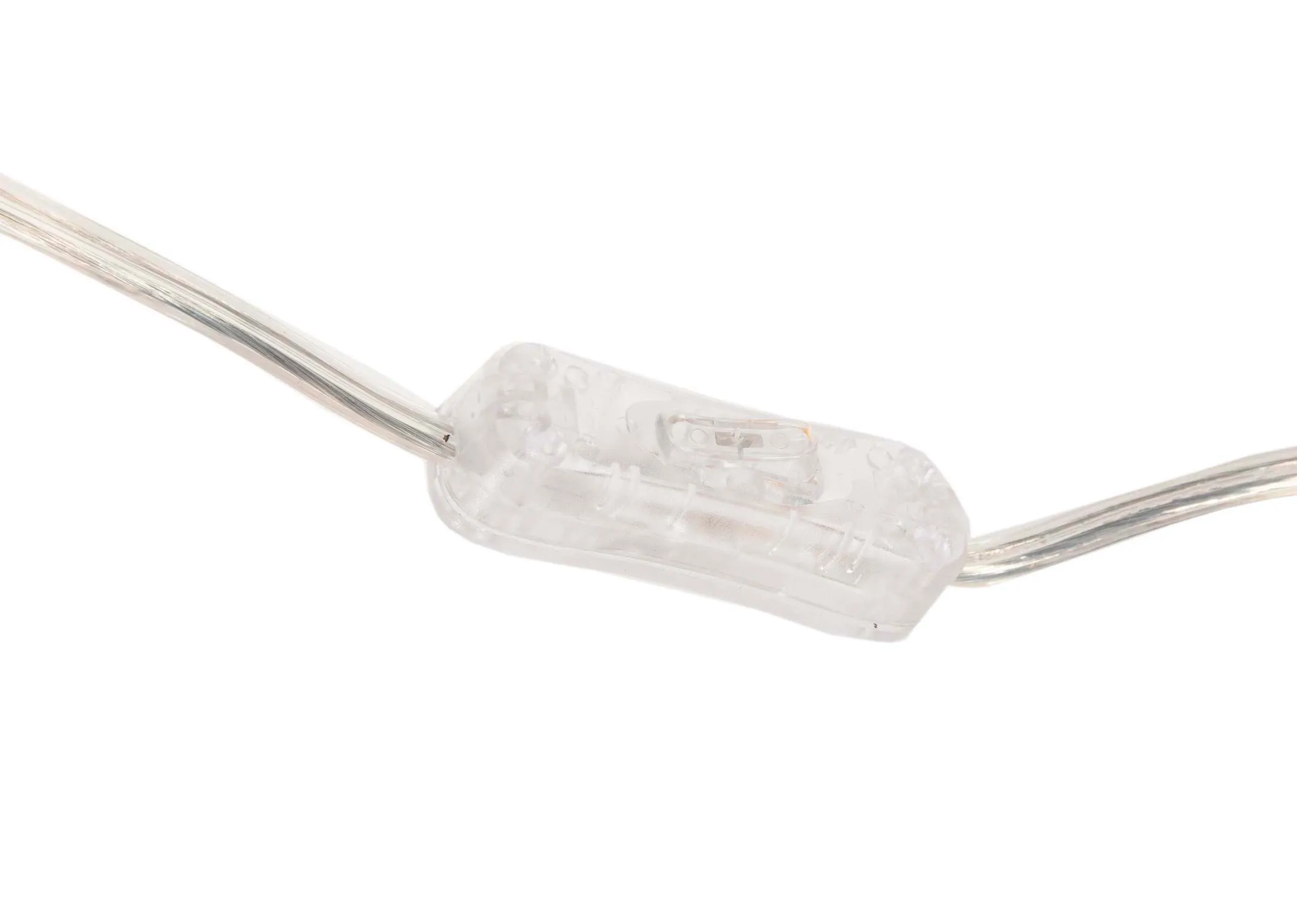 A round orange glass table lamp with off white shade fro EZ livings Alabama range. Closeup of clear inline switch