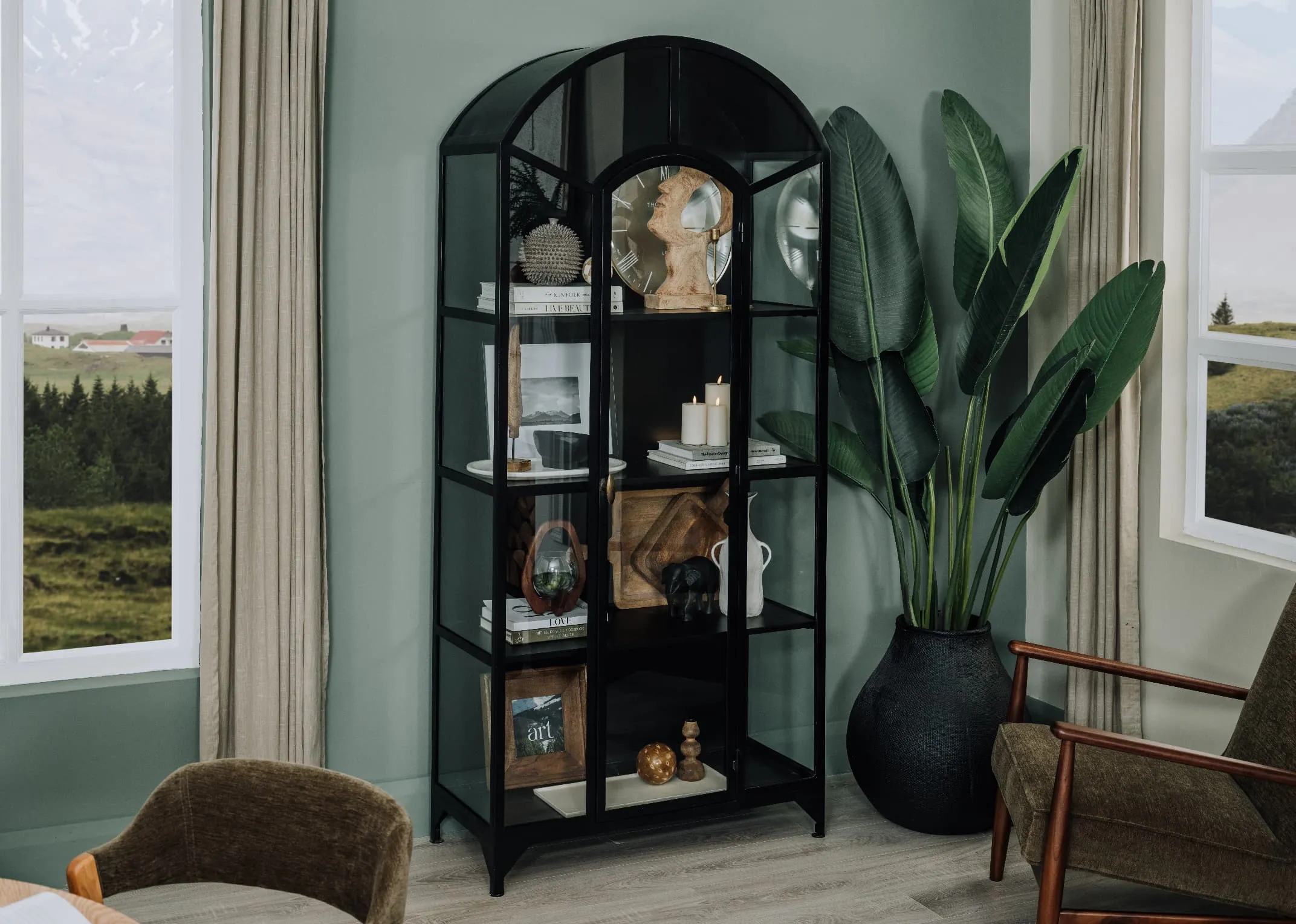 A lifestyle image of the Trident display cabinet with door open showing 4 shelves of ornaments