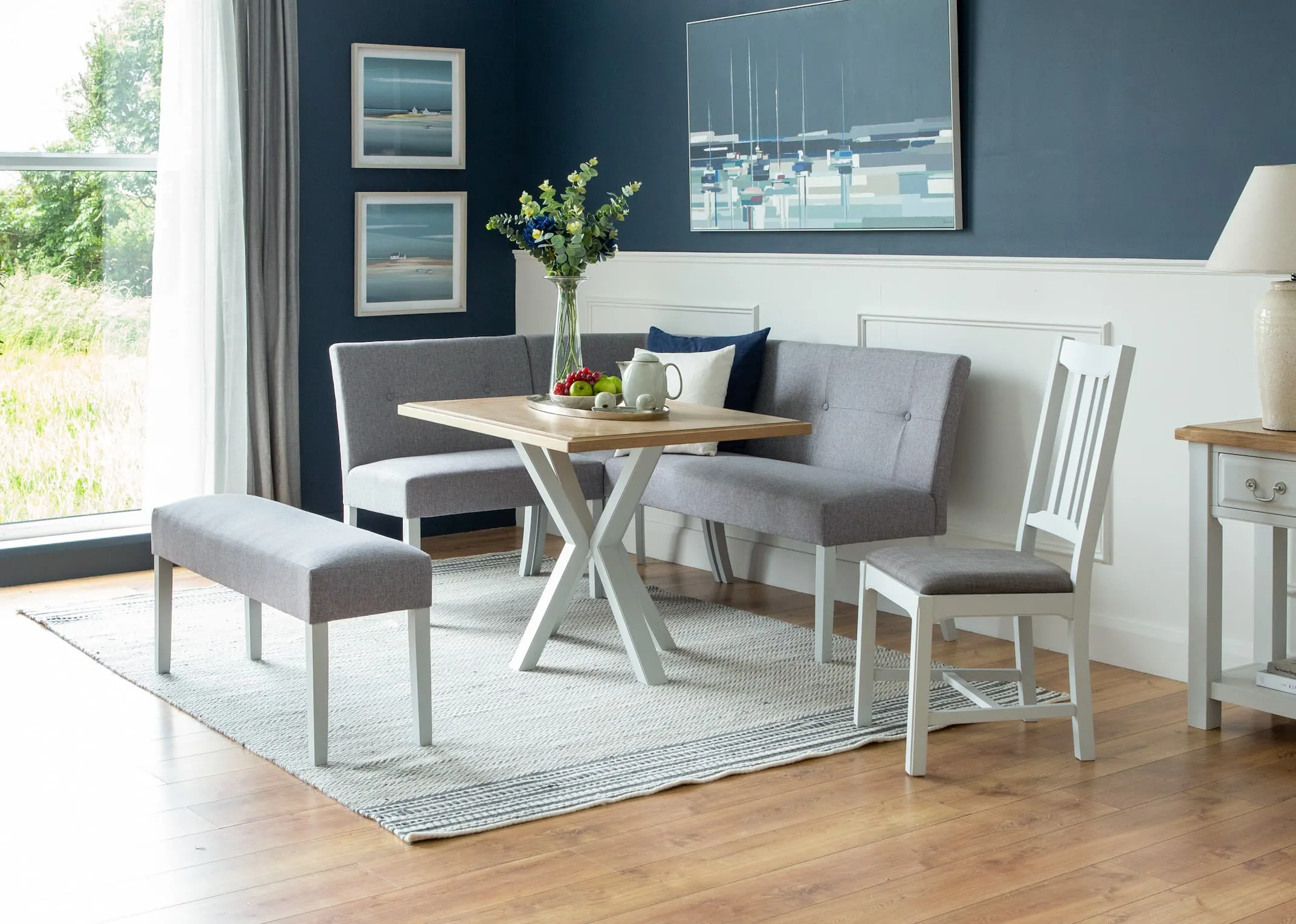 A lifestyle image of the Georgia Bench with bench and dining chairs from EZ Living Furniture.