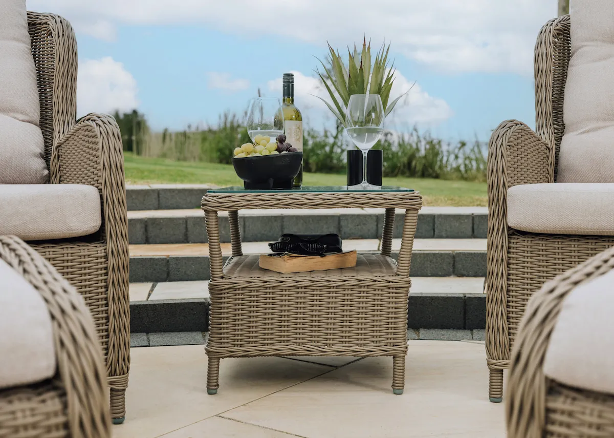 A lifestyle image of the Laurel table in use for drinks etc