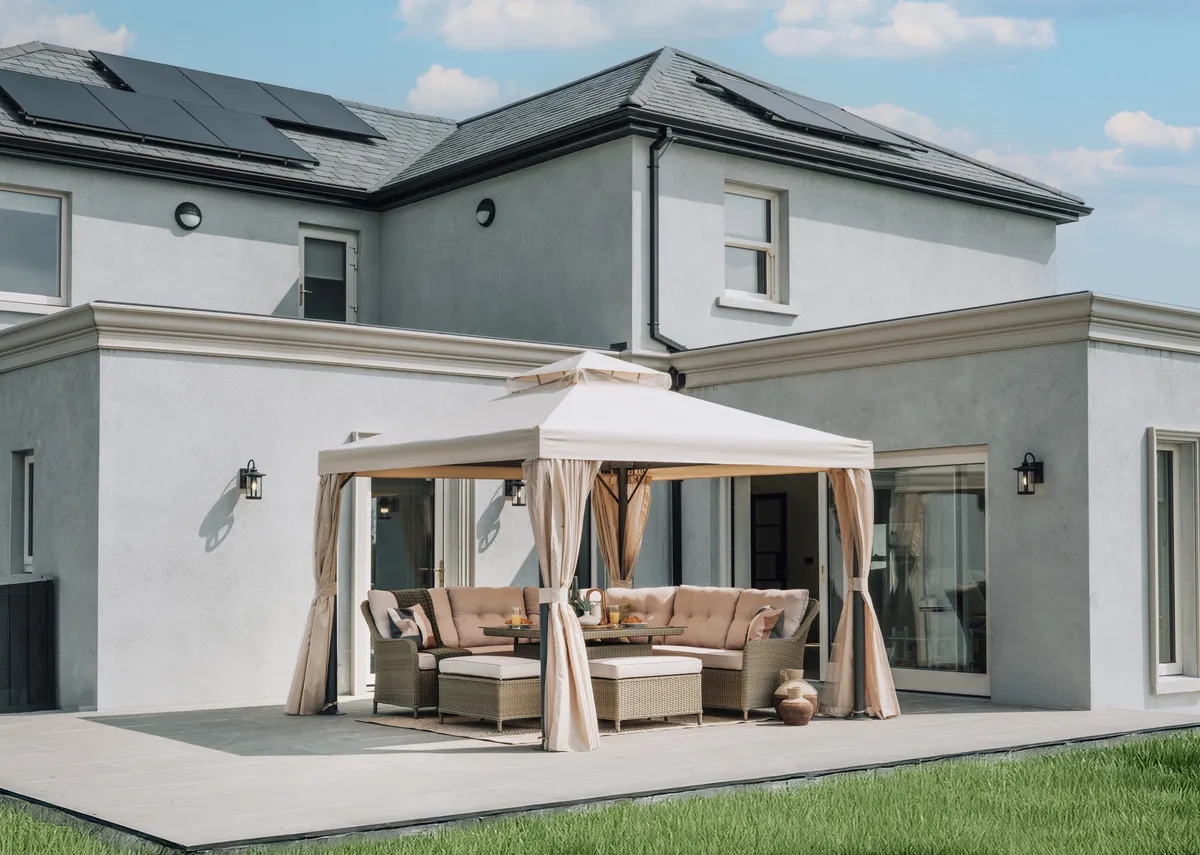 A beige garden gazebo from EZ Livings Alhambra Range. Side view