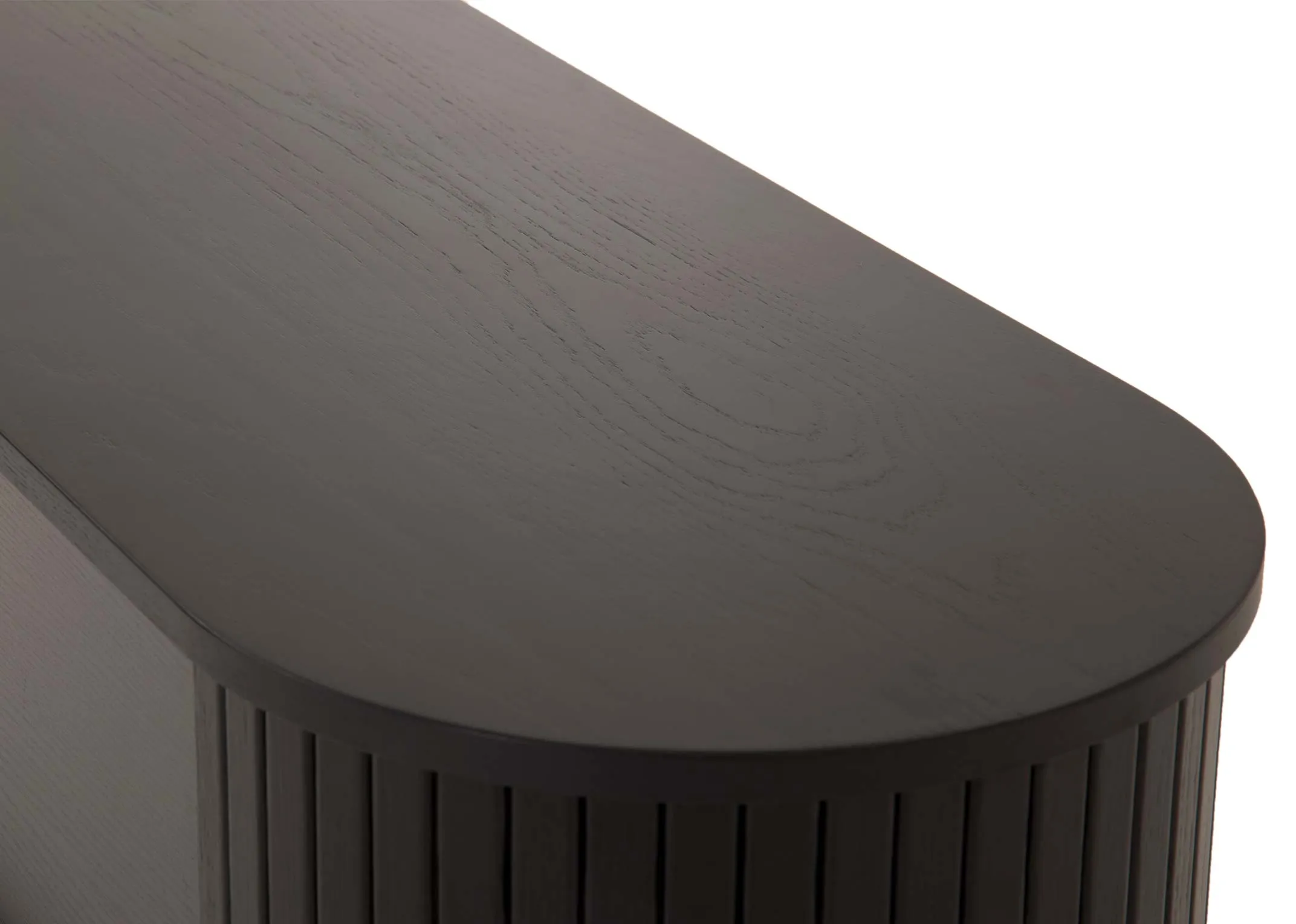A black oak tv unit with a slatted tambour double door from EZ Livings Nola range. Closeup of the wood effect top