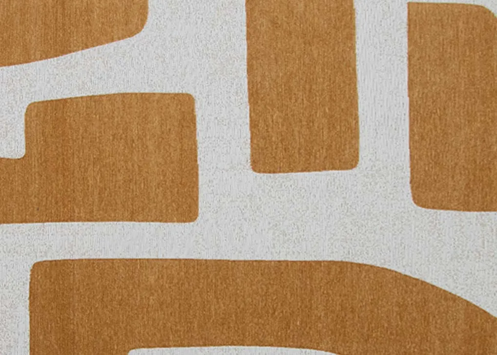 A gold and grey abstract print rug from EZ Livings Chace range. Closeup of gold pattern