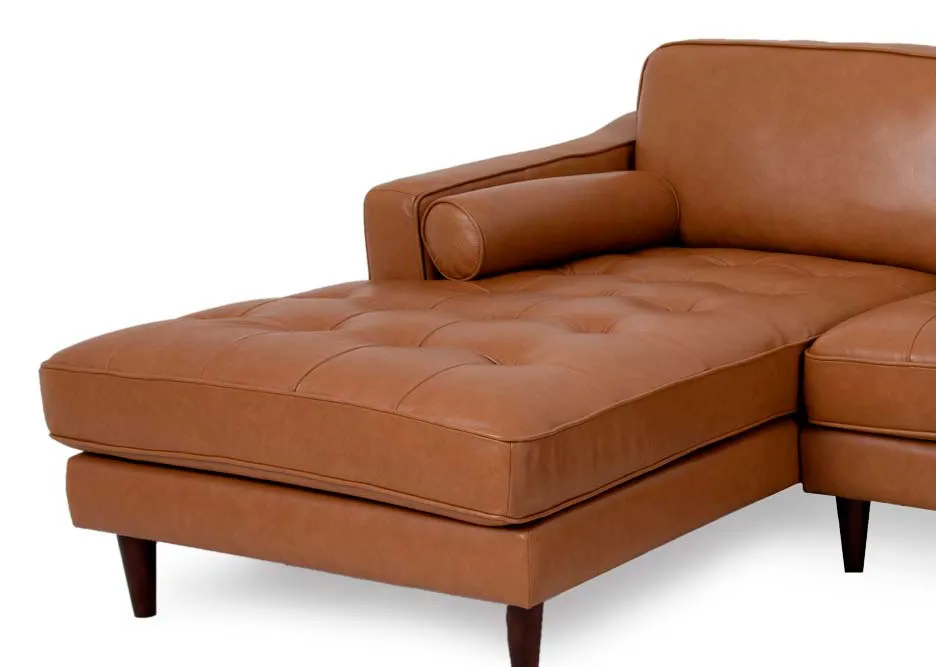 A RHF tan leather corner chaise from EZ Livings Genoa range. Closeup of the tufted button detail on the chaise