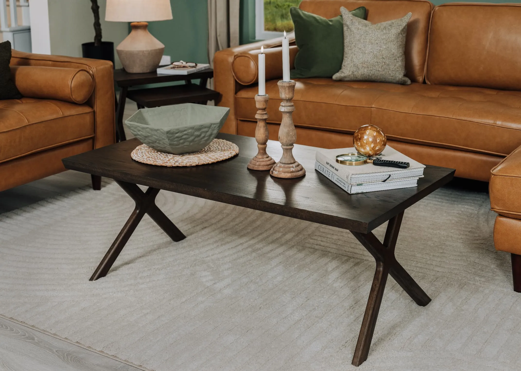 A lifetsyle image of the Milton coffee table with Genoa sofa and Eli rug.