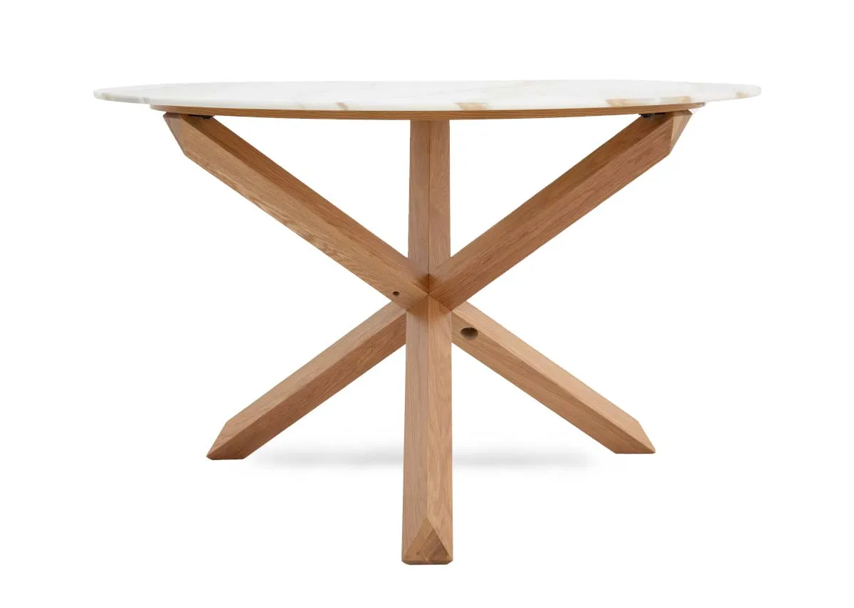 A round melamine top dining table with oak legs from EZ Livings Ravello range.