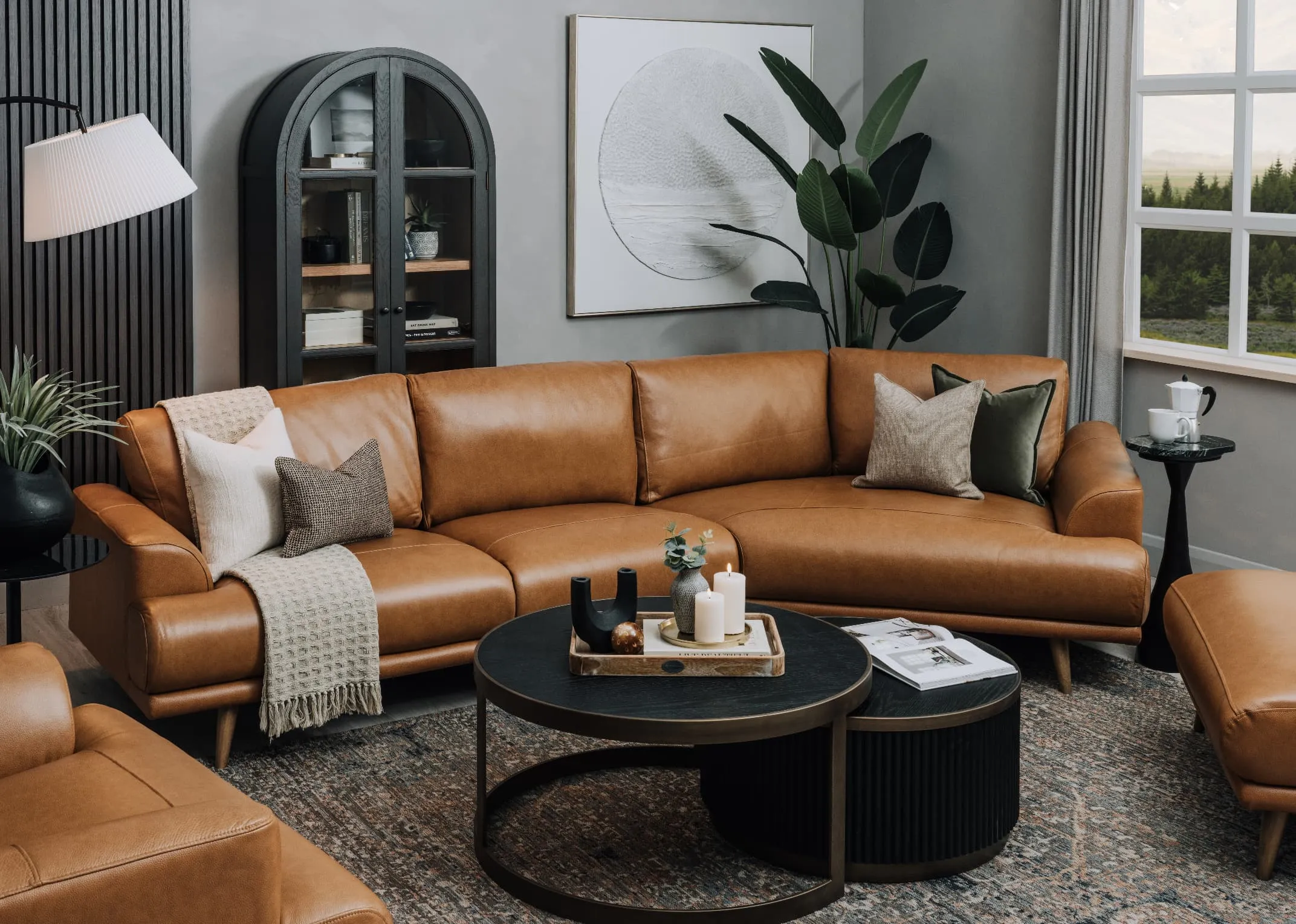 A lifestyle image of the Legend brown leather sofa with Maxima rug