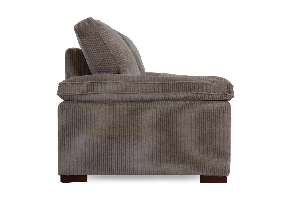 A 3 seater beige sofa in cord fabric from EZ Livings Westport range. Side view