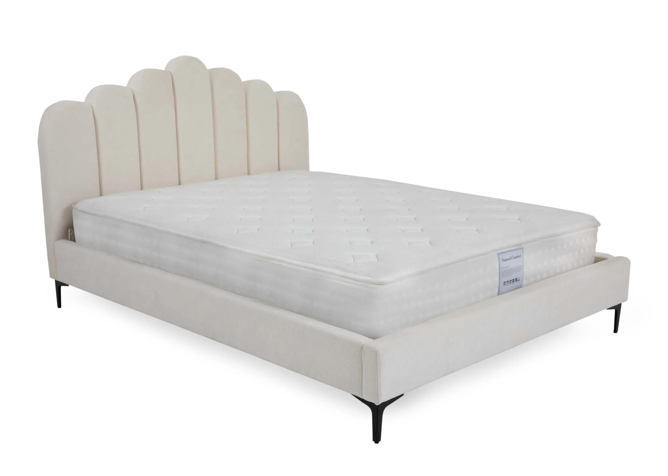 A cream velvet bedframe with scallop headboard from EZ Living Furnitures Faye range. Angled view of the bed with mattress not included.