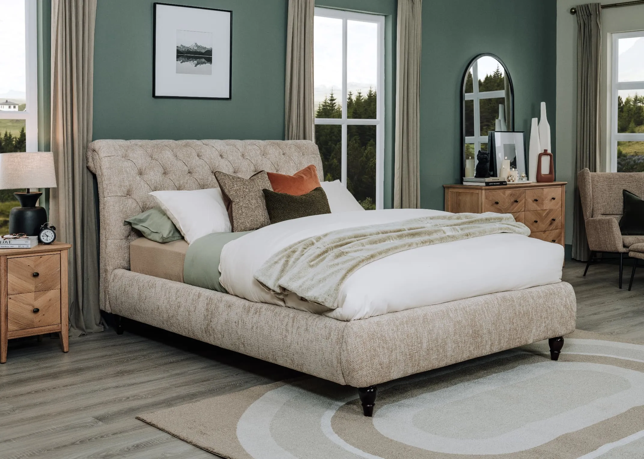 A lifestyle image of the Duchess beige bedframe with delilah rug and chevron oak furniture.