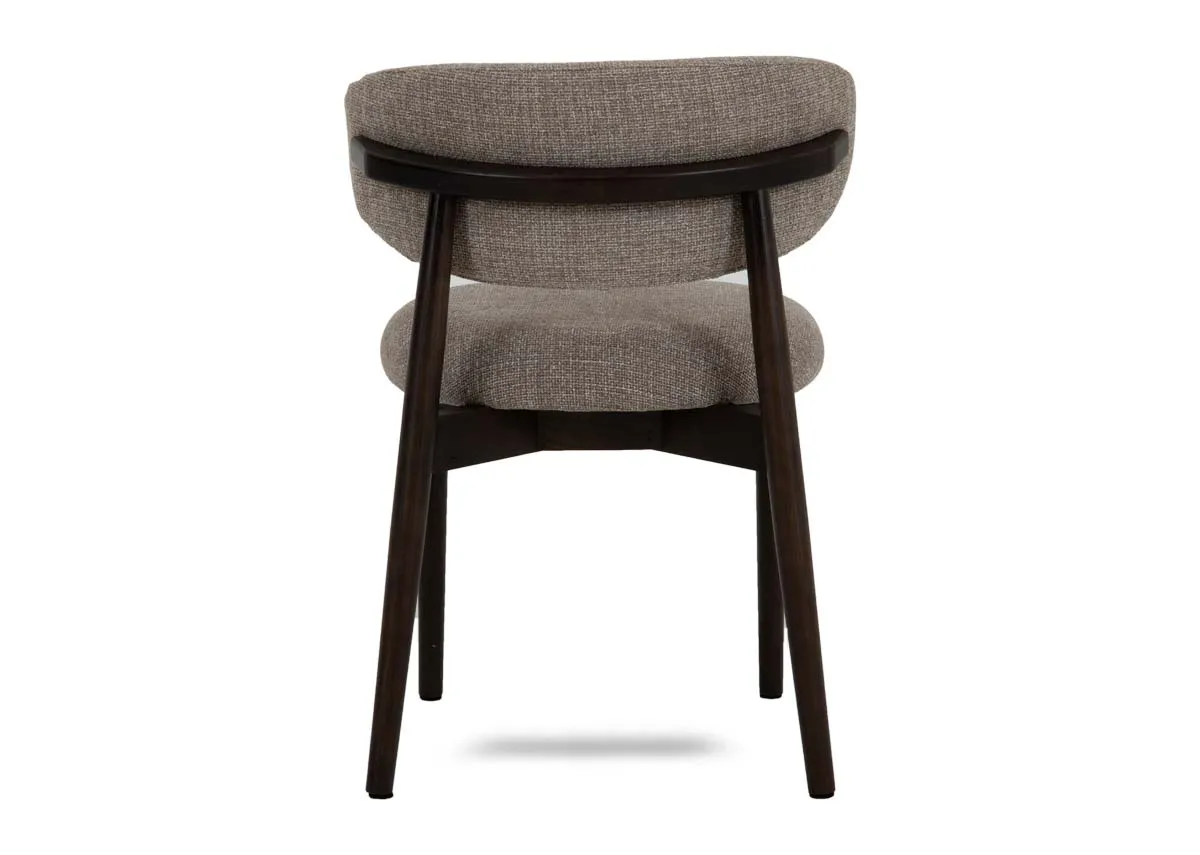 A beige dining chair with fabric seat and back with wood frame from EZ Livings Hazel range.