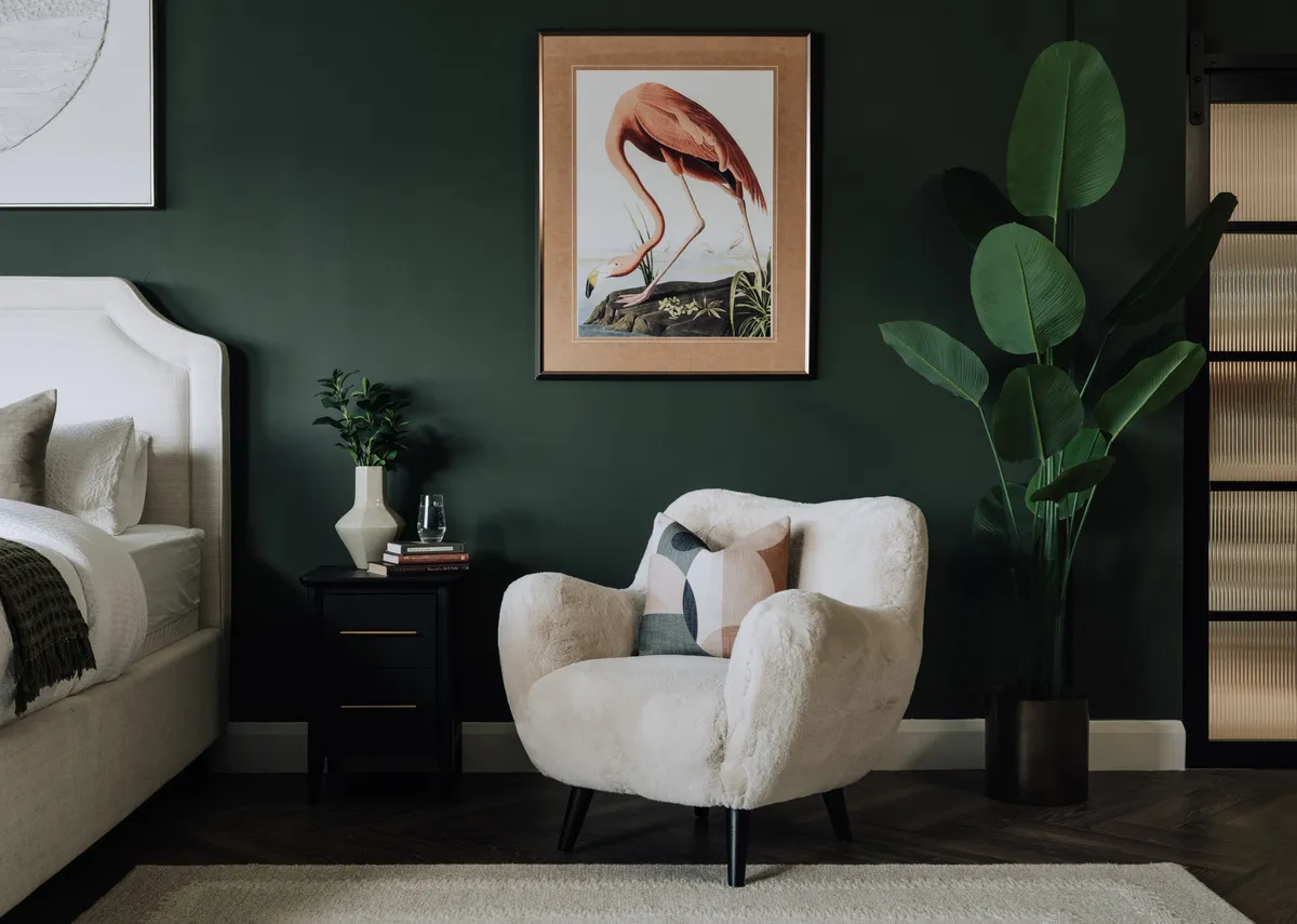 A lifestyle image of the Globe accent chair with Flamingo picture and Chevron locker.