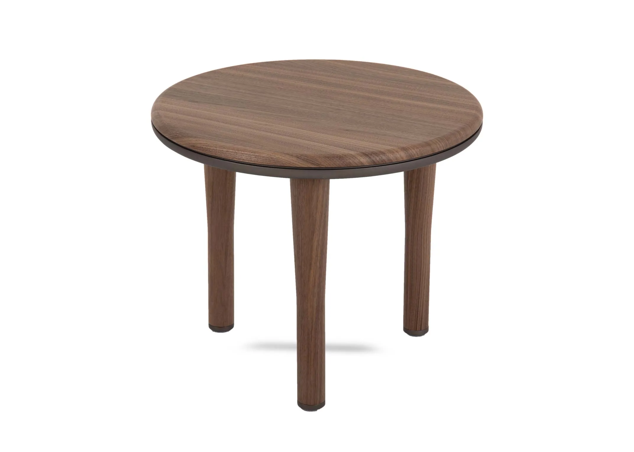 A round walnut side table from EZ Livings Breeze range. Angled view of round top and 3 legs.
