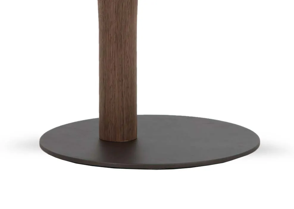 A round walnut side table from EZ Livings Breeze range. Closeup of metal base