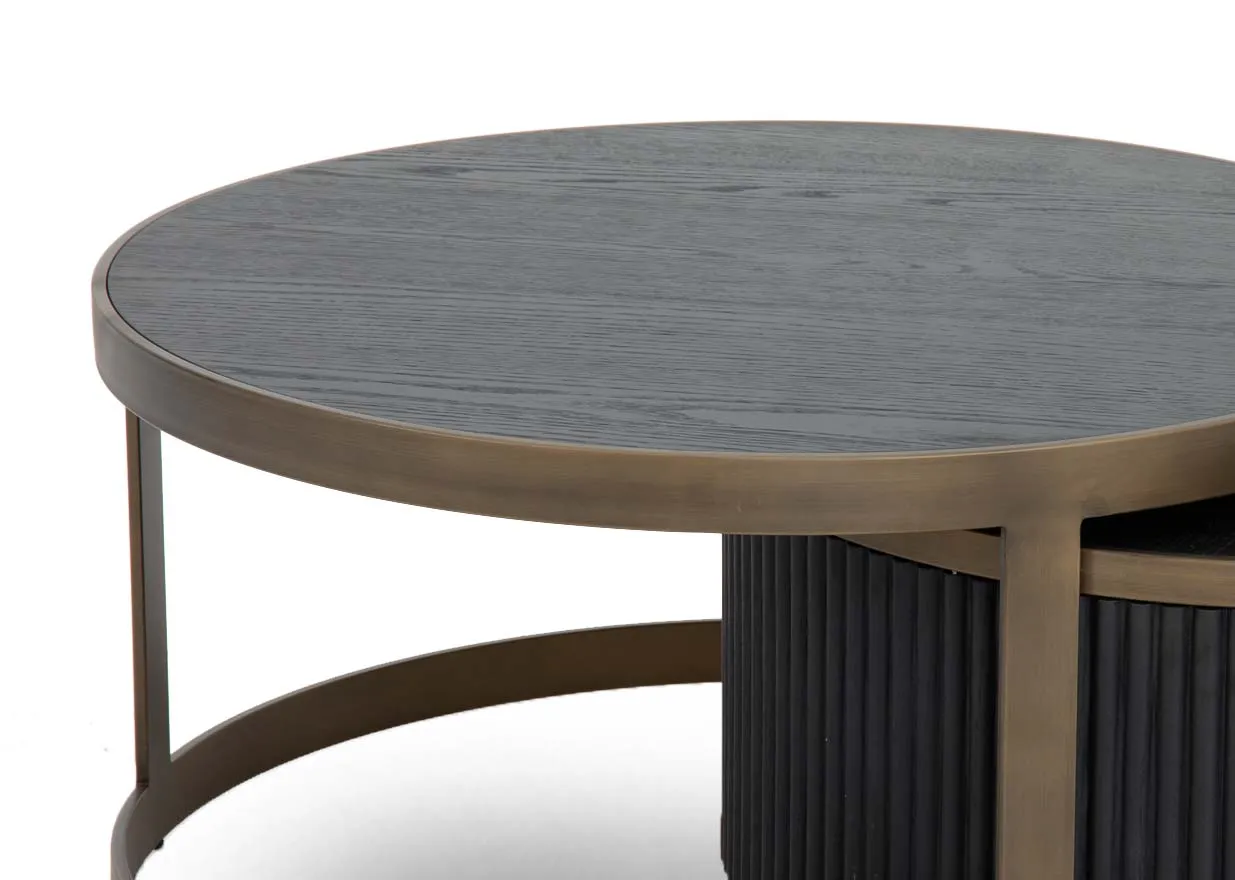 A nest of 2 round tables one inserted into the other from EZ Livings Palm range. Closeup of black oak table top and accordian sides on smaller table.