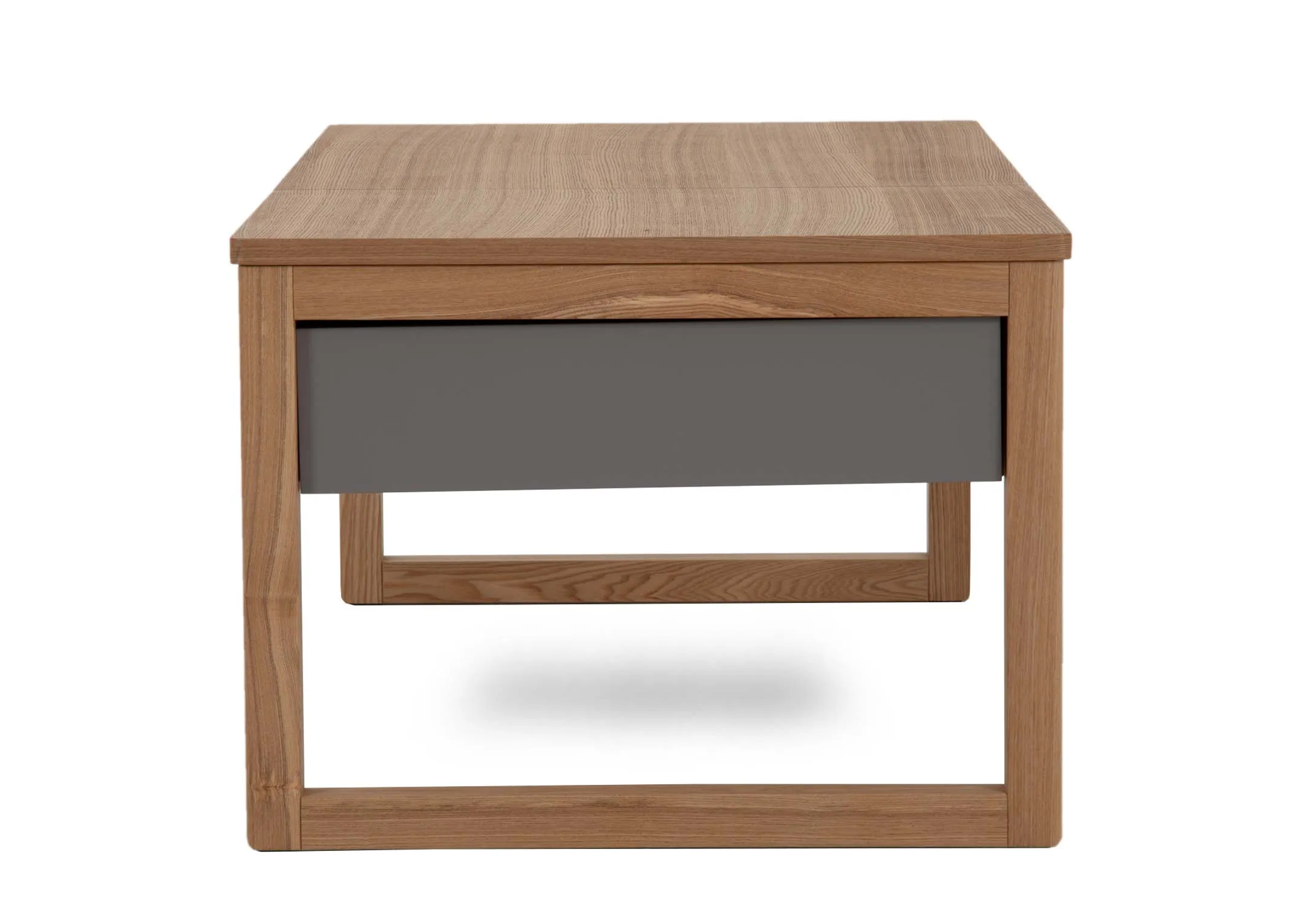 An ash wood rectangular table from EZ Livings Leif range. Side view of grey painted drawer to side of table