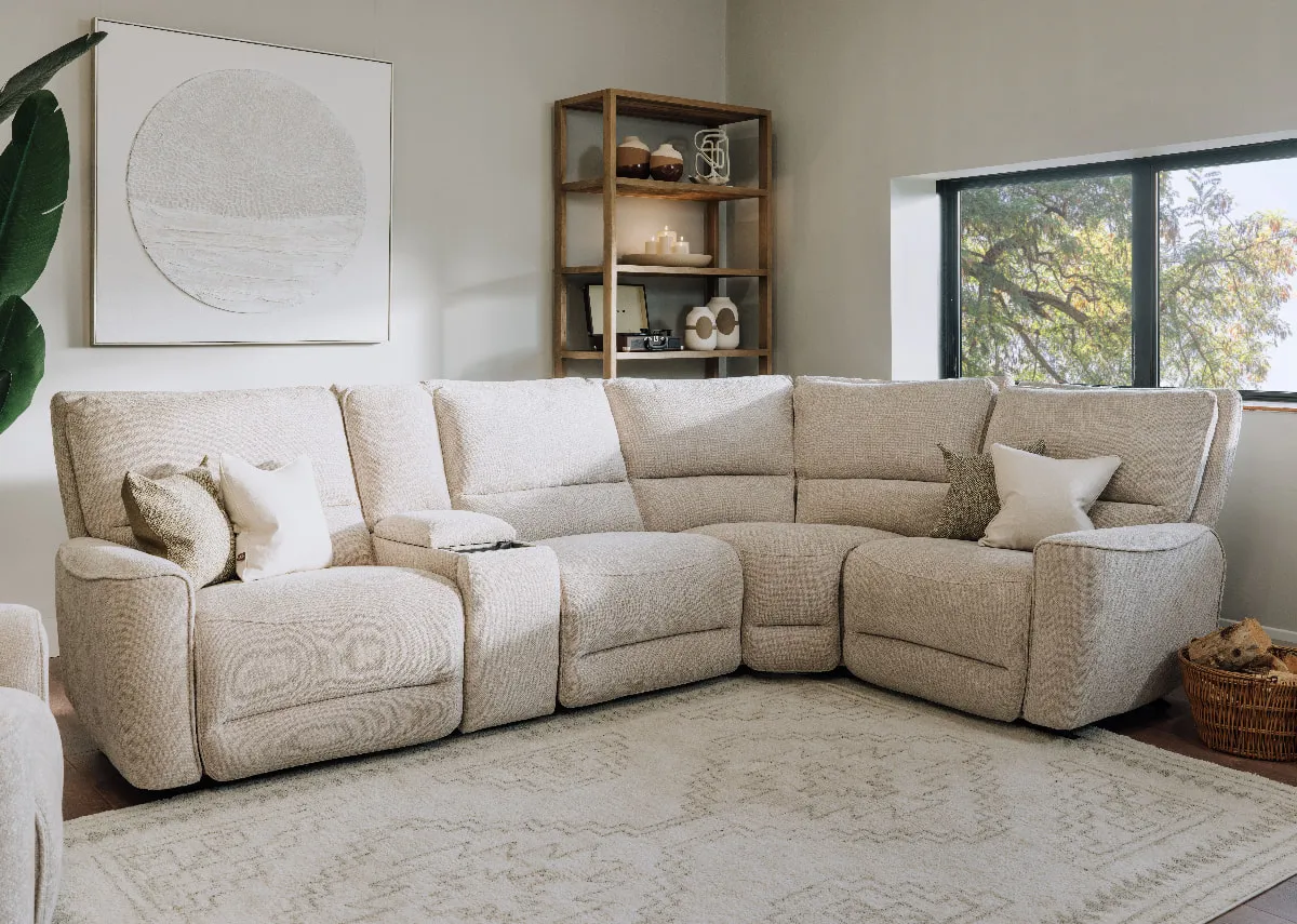 A lifestyle image of the Ashbrook corner sofa with with Nova bookcase.