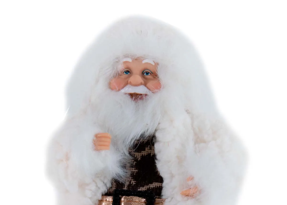 A traditional cream Santa Claus figurine from EZ Livings Christmas range. Closeup of furry coat and hood up