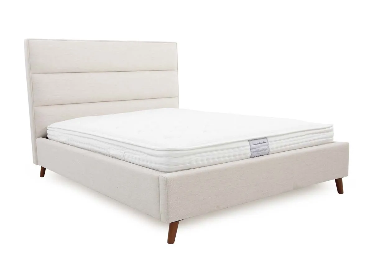 A beige fabric 6ft bedframe from EZ Livings Ebony range. Angled view of bed with mattress not inclided