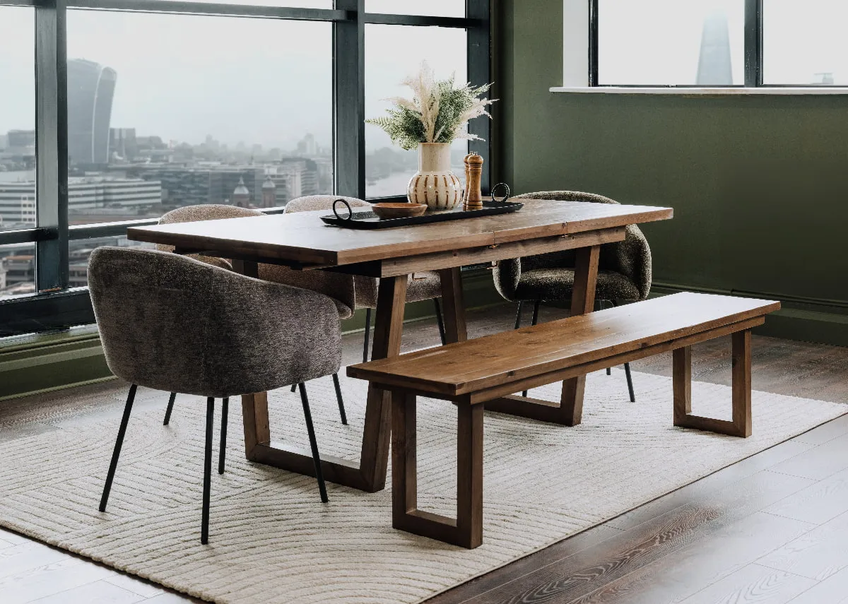 A cashew reclaimed wood dining table from EZ Livings Ladder range. Closeup of leaf hidden under the table.
