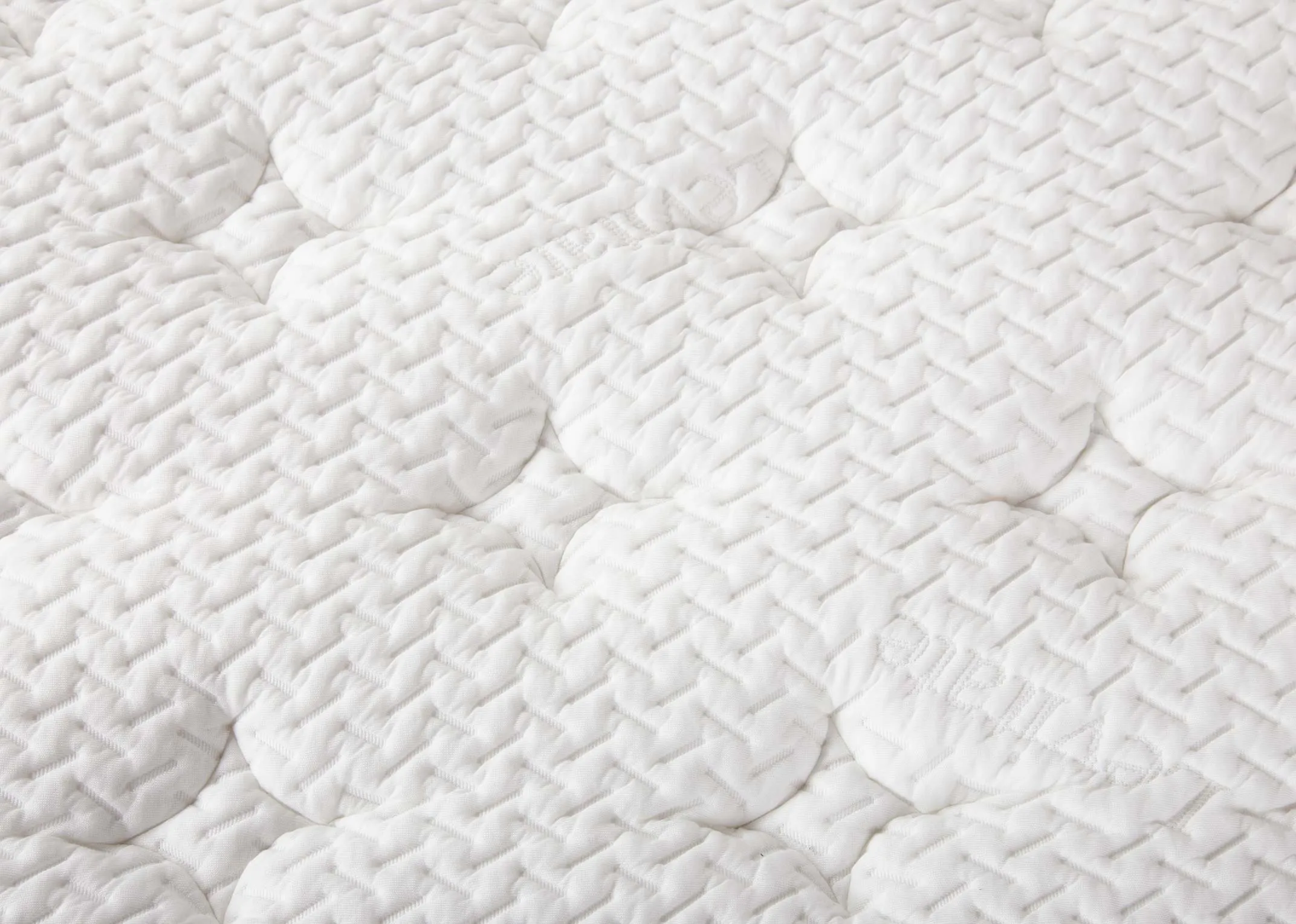 A single mattress with 2000 pocket springs from EZ Livings Thcool range. Closeup of erma-texture & pocket springs