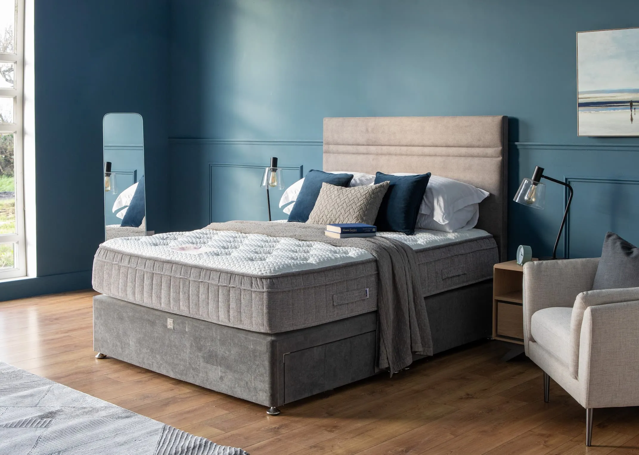 A lifestyle image of the Therma Cool 2000 on a divan bed base with brunel bedside lockers & karina lamps