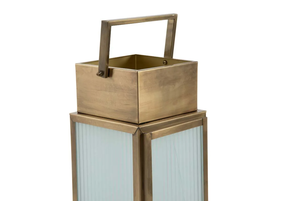 A large gold metal framed lantern from EZ Livings Dalia range. Closeup of gold handle