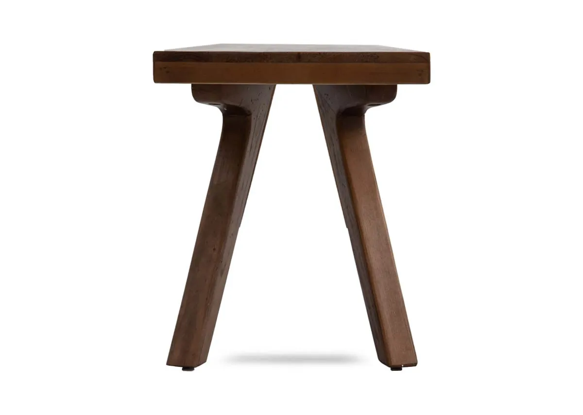 A brown reclaimed wood dining bench from EZ Livings Albion range. Side view