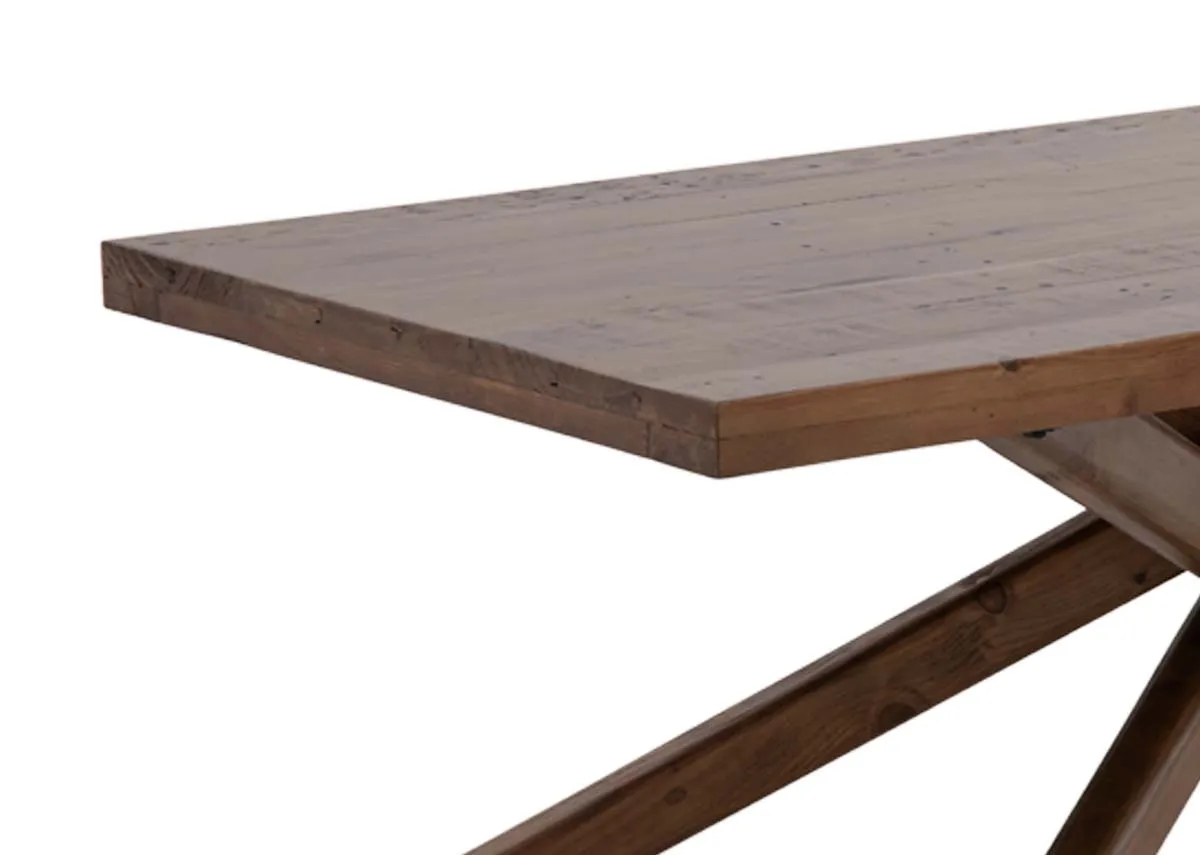 A brown chunky top reclaimed wood dining table from EZ Livings Albion range.Closeup of thick wood top