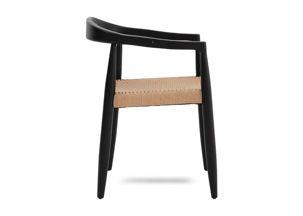 A black framed curved back dining chair with woven seat from EZ Livings Albion range. Side view of curved frame