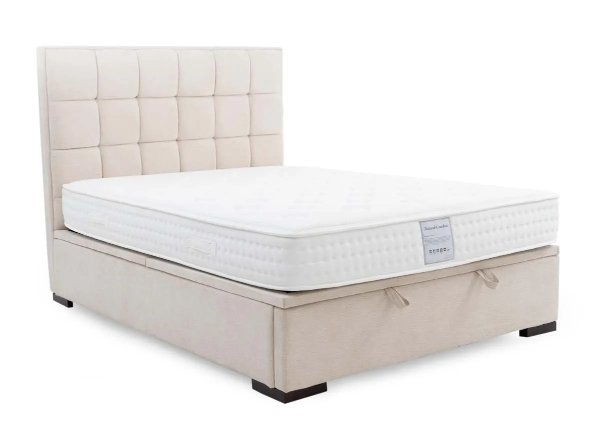 A beige ottoman bed from EZ Livings Sadie Range. Angled view of bed with mattress not included