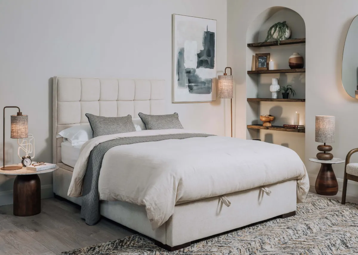 A lifestyle image of the Sadie Ottoman with slade tables