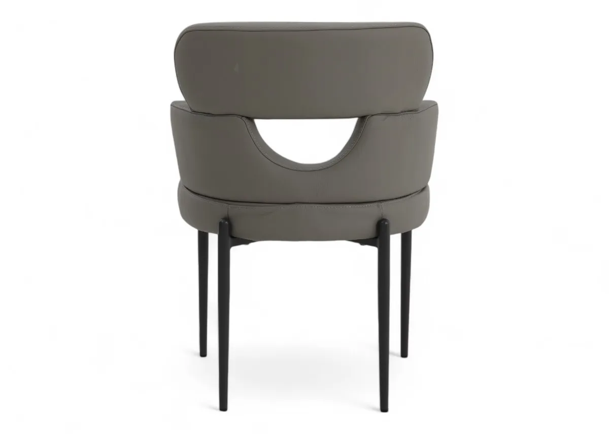 A grey leather dining chair with metal legs from EZ Livings Fusion range. Back view