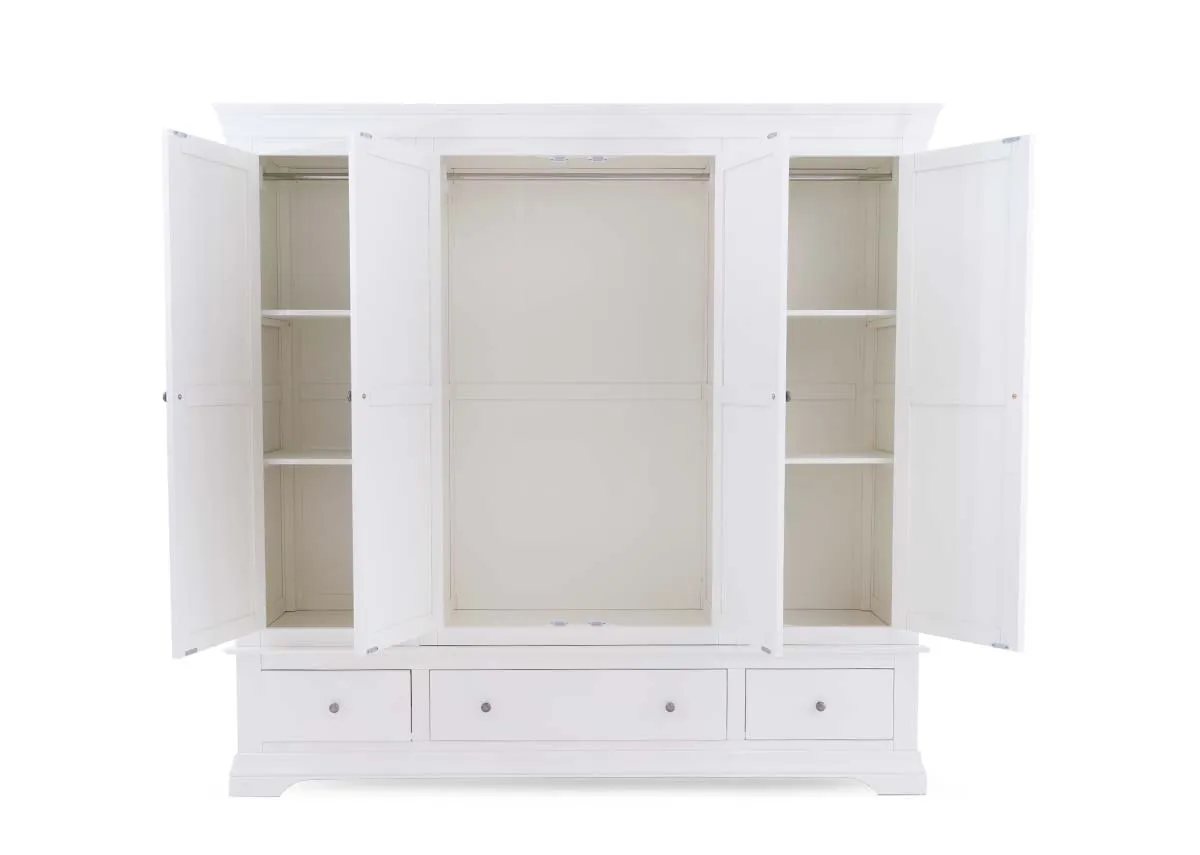 A 4 door wardrobe in white from EZ Livings Dove range. Front view of the doors open showing 3 shelves eitehr side