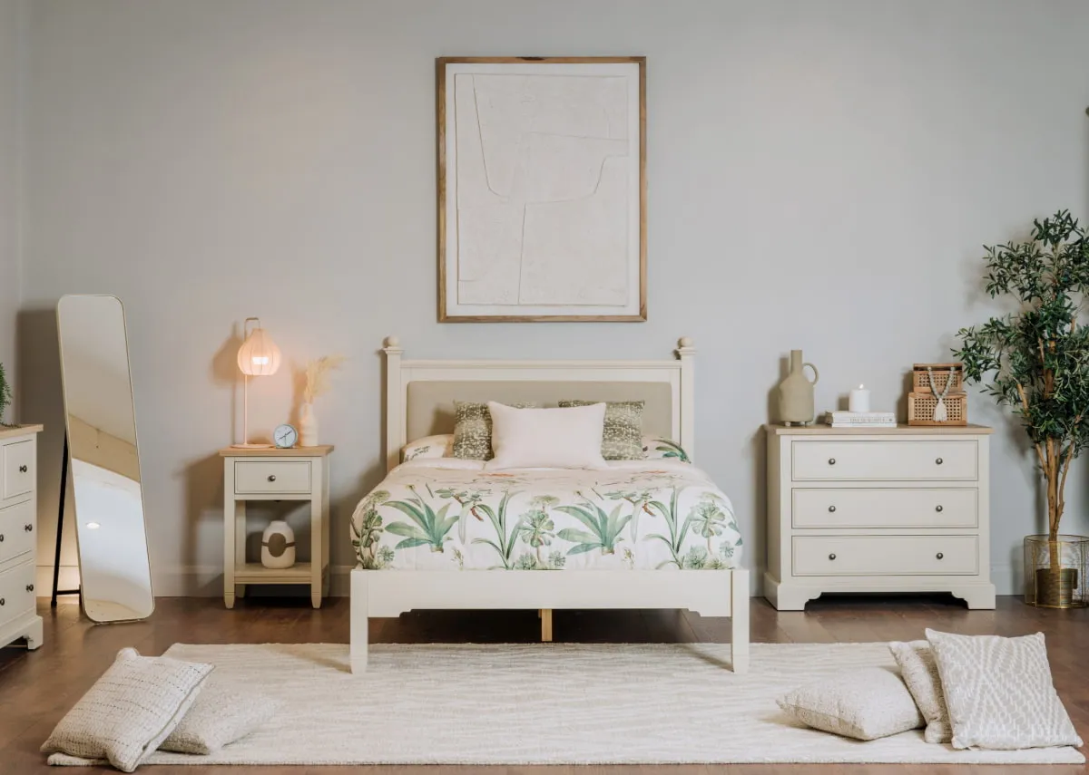 A lifestyle image of the Dawn 4ft6 Bedframe with chest and locker with Rilla table lamp.