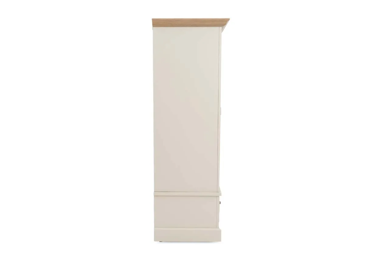 A 2 door cream wardrobe from EZ Livings Dawn range. Side view of pine top