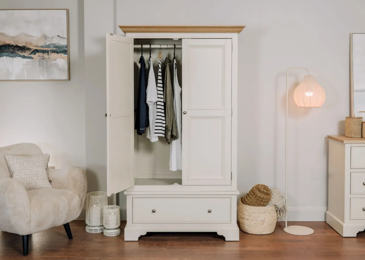 A lifestyle image of the Dawn wardrobe open to show hanging storage