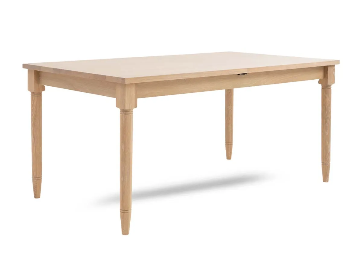 A rectangular oak dining table from EZ Livings Dawn range. Angled view