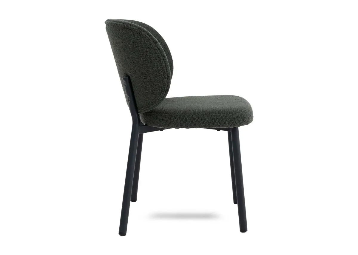 A green boucle fabric dining chair from EZ Livings Swan range. Side view