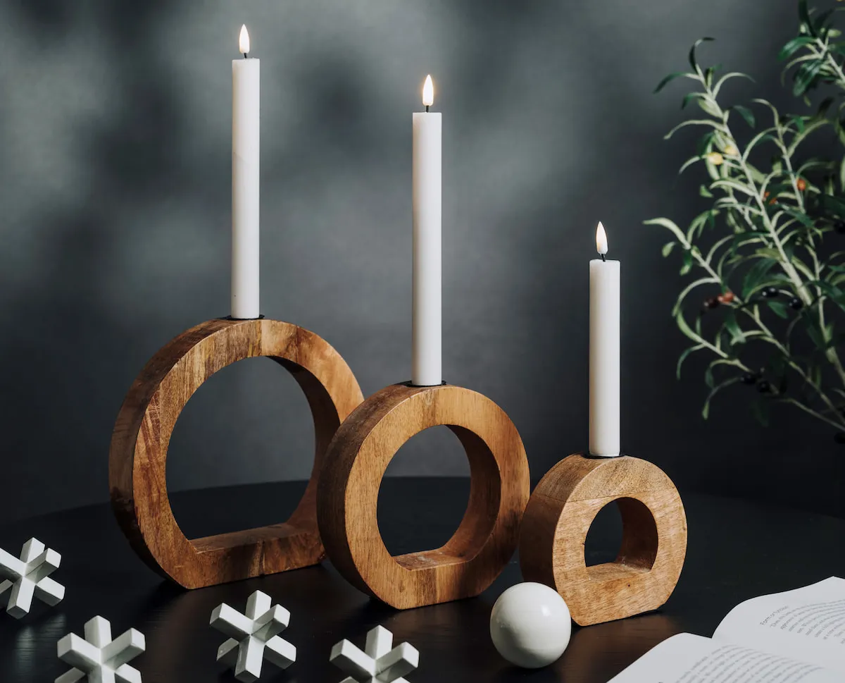 A set of Blake 3 wood arched candle holders from EZ Livings accessories with led dinner candles