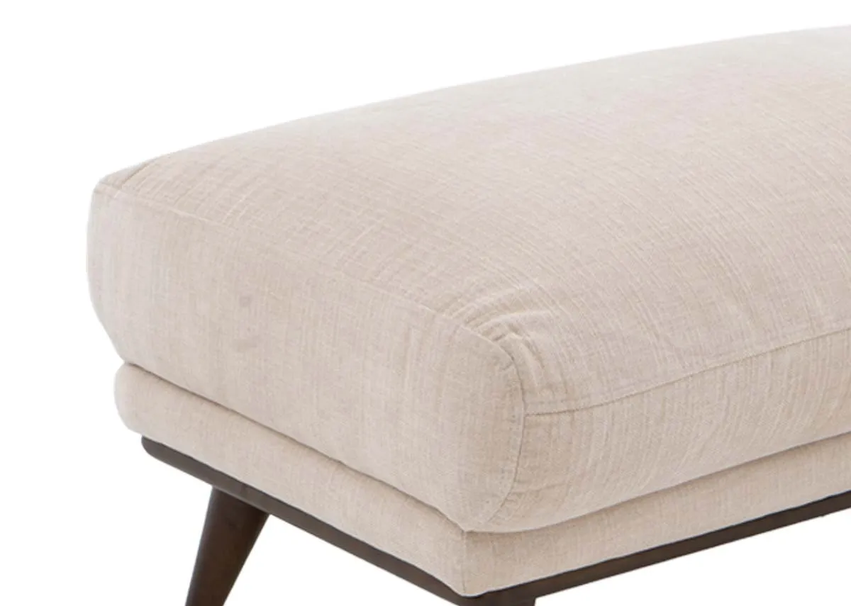 A cream large footstool from EZ Livings Pippa Range. Closeup of luxurious fabric