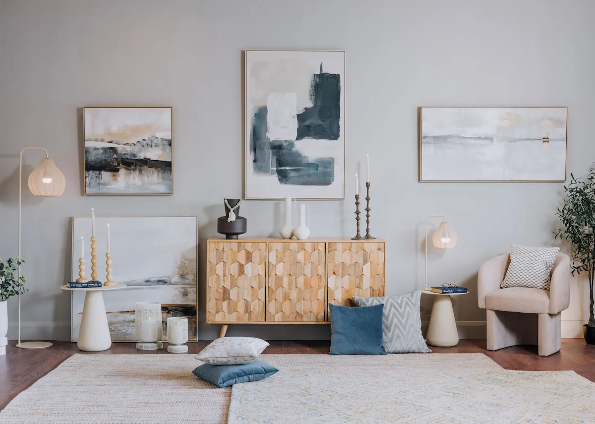 A lifestyle image of the Cologne sideboard with a selection of light & living vases including the Panzano