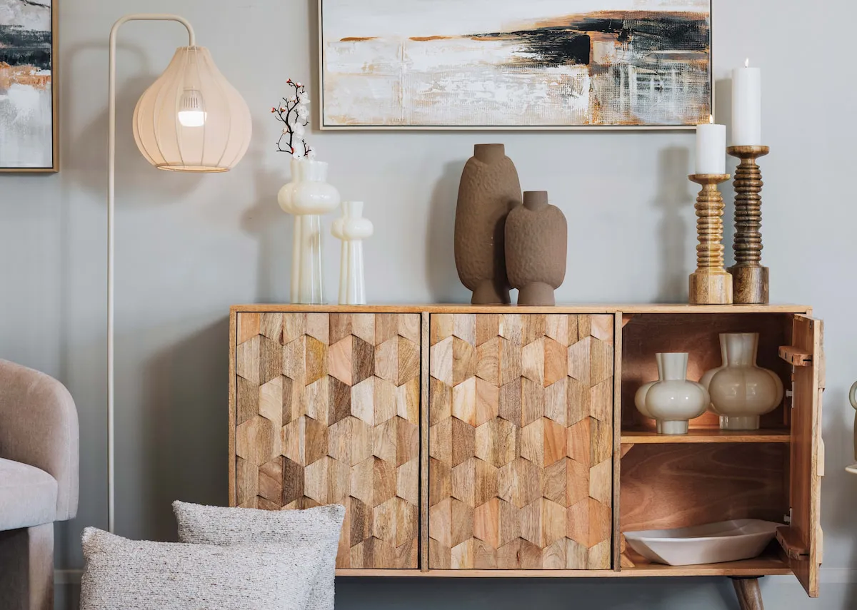 A lifestyle sideboard with a selection of the light & living vases
