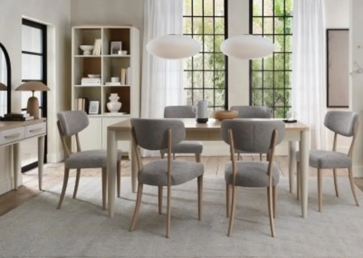 A lifestyle image of the Larsen Dining Table and chairs