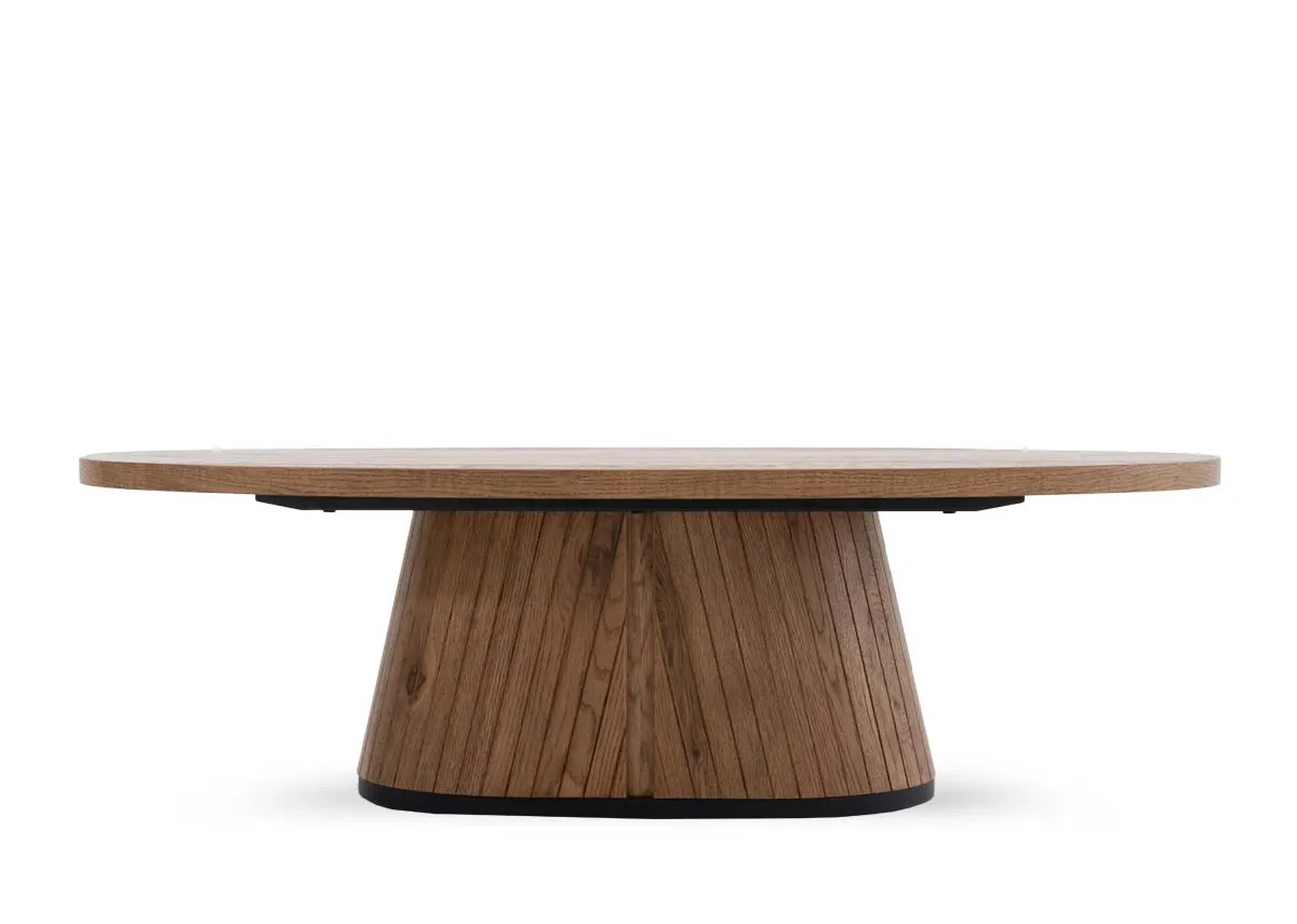 An oval coffee table in rustic oak from EZ Livings Vega range. Front view of thick base